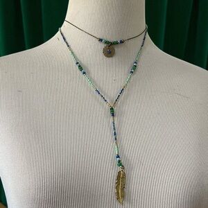 LARIAT CHOKER SEED BEADED NECKLACE WITH GOLD TONE FEATHER PENDANT